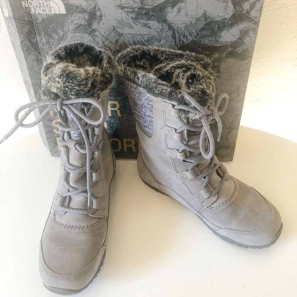 North face tall lace up winter boot. Size 6
